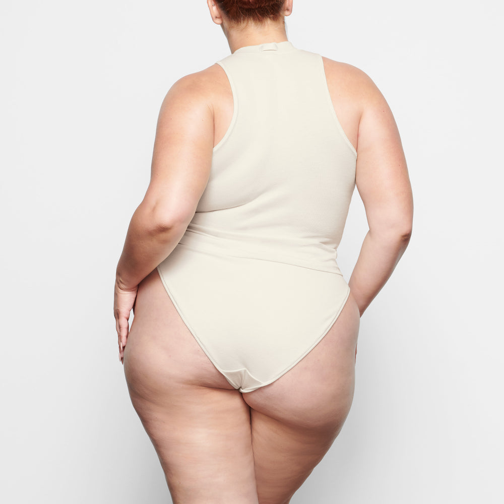 Skims COTTON RIB MID RISE Brief Wit | 32WMYCILN