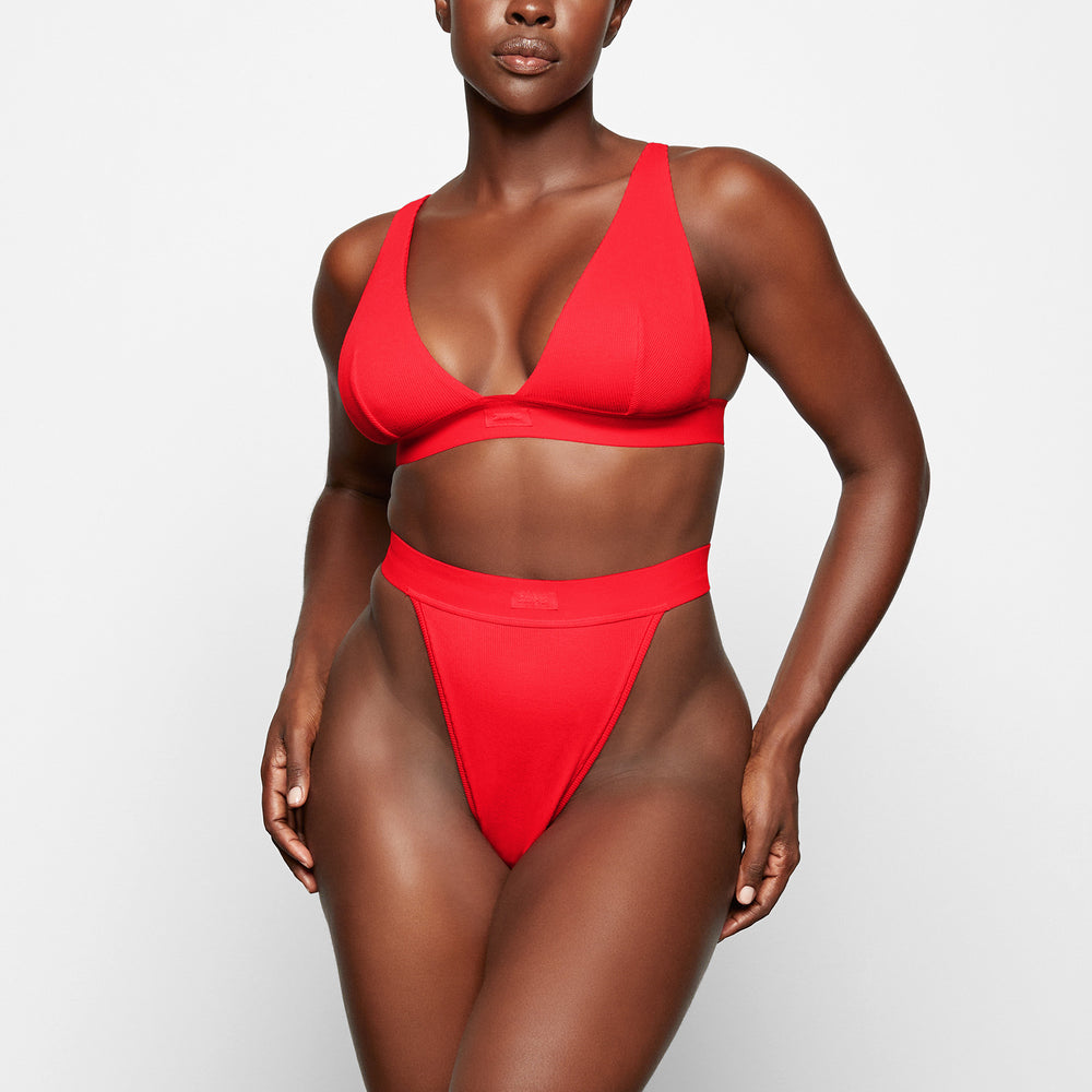 Skims COTTON RIB Thong Rood | 90DYKIGFN