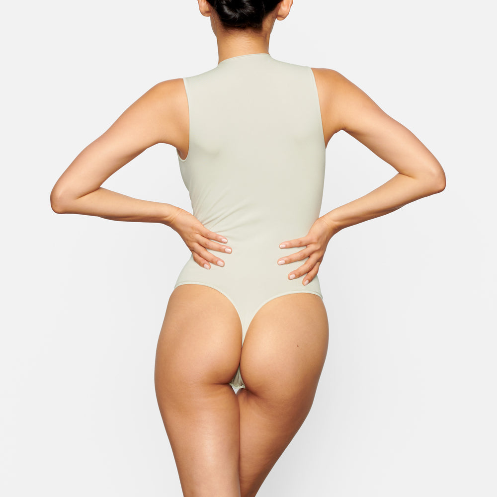 Skims ESSENTIAL CREW NECK Sleeveless Bodysuit Wit | 72IQKTSJE