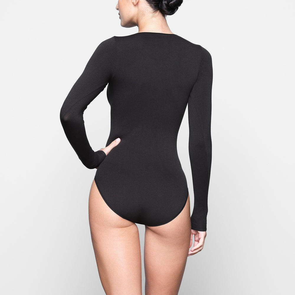 Skims LIGHT ESSENTIAL CREW NECK Long Sleeve Bodysuit Zwart | 26MGCRWUZ