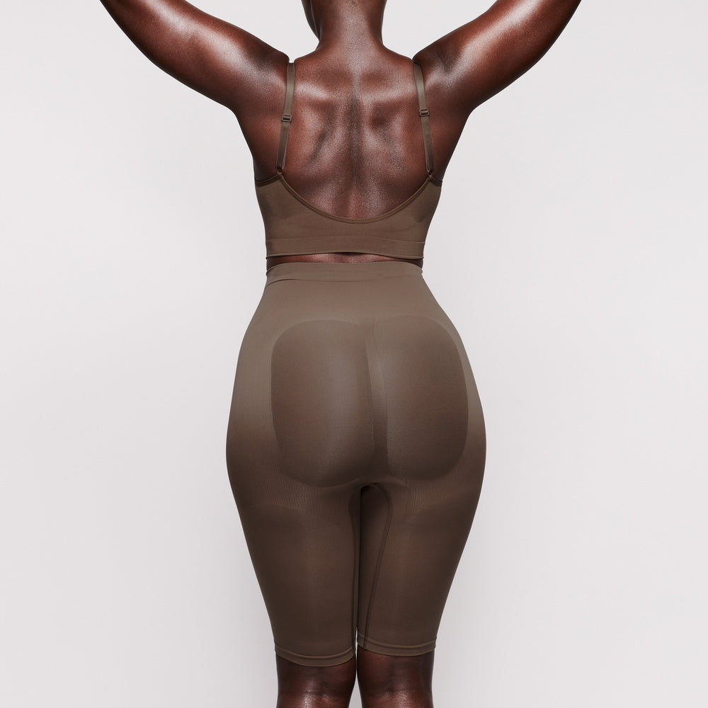Skims SCULPTING ABOVE THE KNEE Korte Broek Abrikoos | 94TMUCSNA