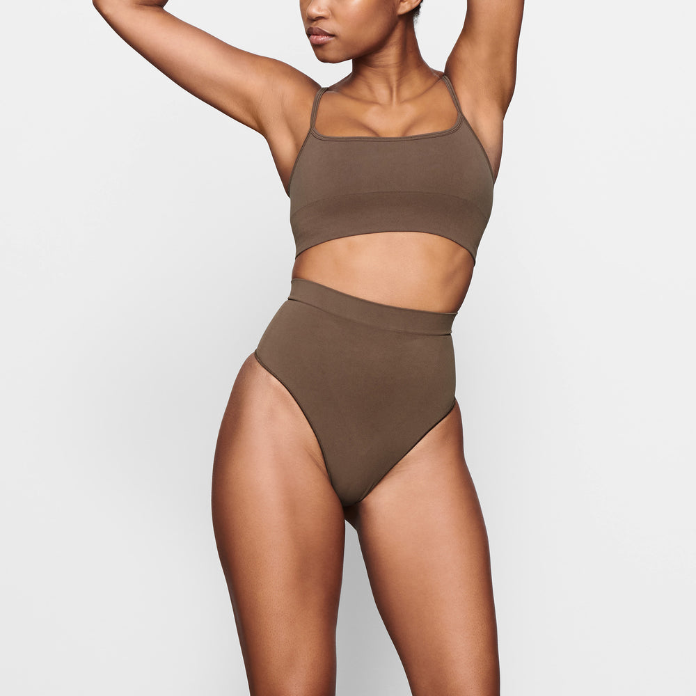 Skims SCULPTING MID WAIST Thong Abrikoos | 29NQDMSJI