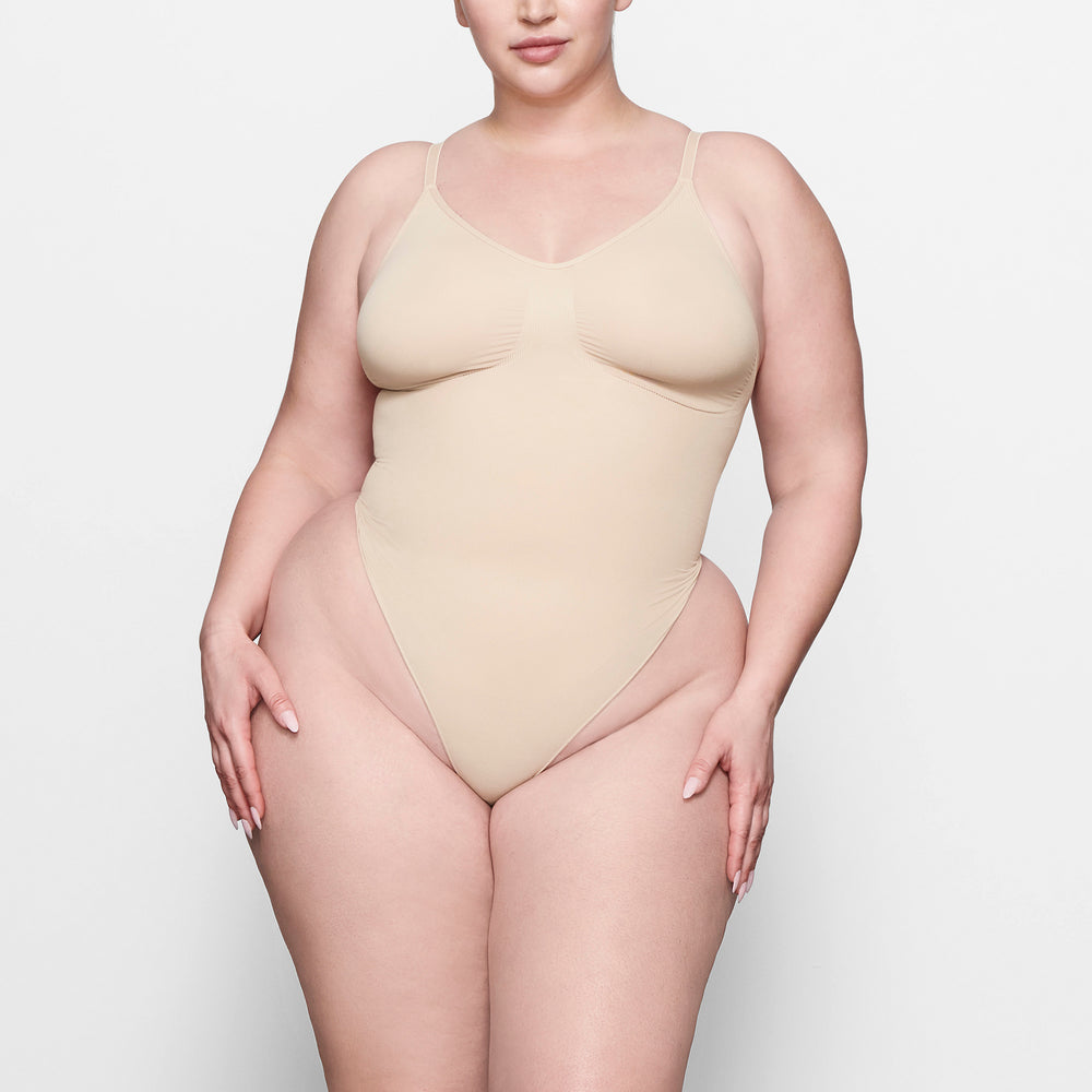 Skims SCULPTING THONG Bodysuit Beige | 56LRMYSEQ