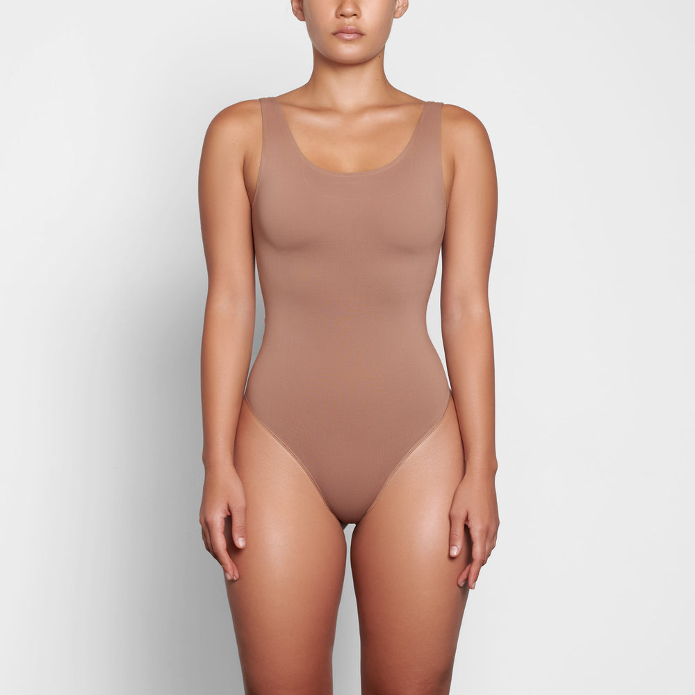 Skims SOFT SMOOTHING Thong Bodysuit Abrikoos | 04JLMRHEO