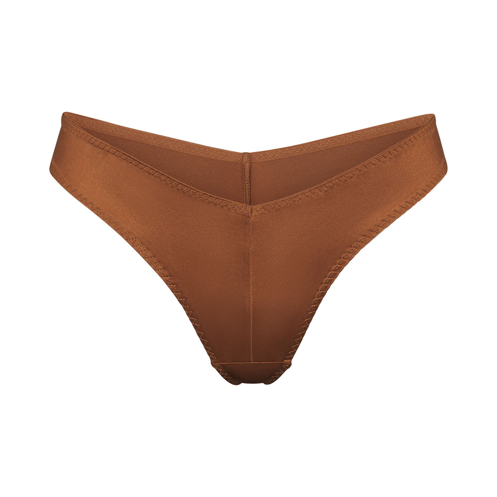 Skims STRETCH SATIN CHEEKY Tanga Abrikoos | 85UGFOHCM